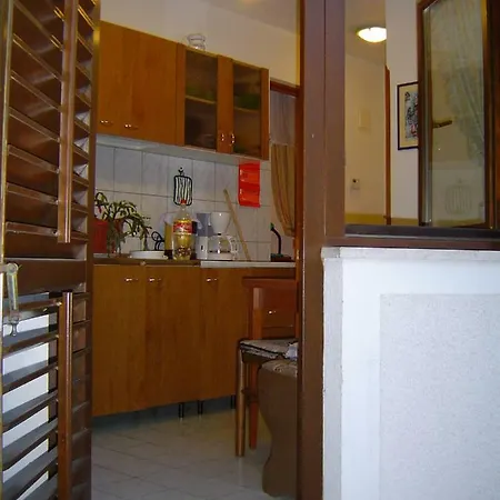 And Tomich Apartment